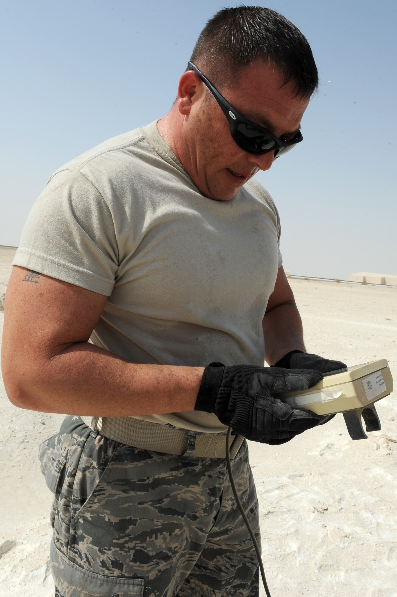 SOUTHWEST ASIA - U.S. Air Force Master Sgt. Don Milliman, 380th Expeditionary Operations Support Squadron weather flight NCO in charge, checks readouts for power and sensor status on a TMQ-53 tactical weather observation station during a periodic maintenance inspection Aug. 31, 2012. Milliman, a St. Augustine, Fla., native, is deployed to the 380th Air Expeditionary Wing from Incirlik Air Base, Turkey. (U.S. Air Force photo/Master Sgt. Scott MacKay)