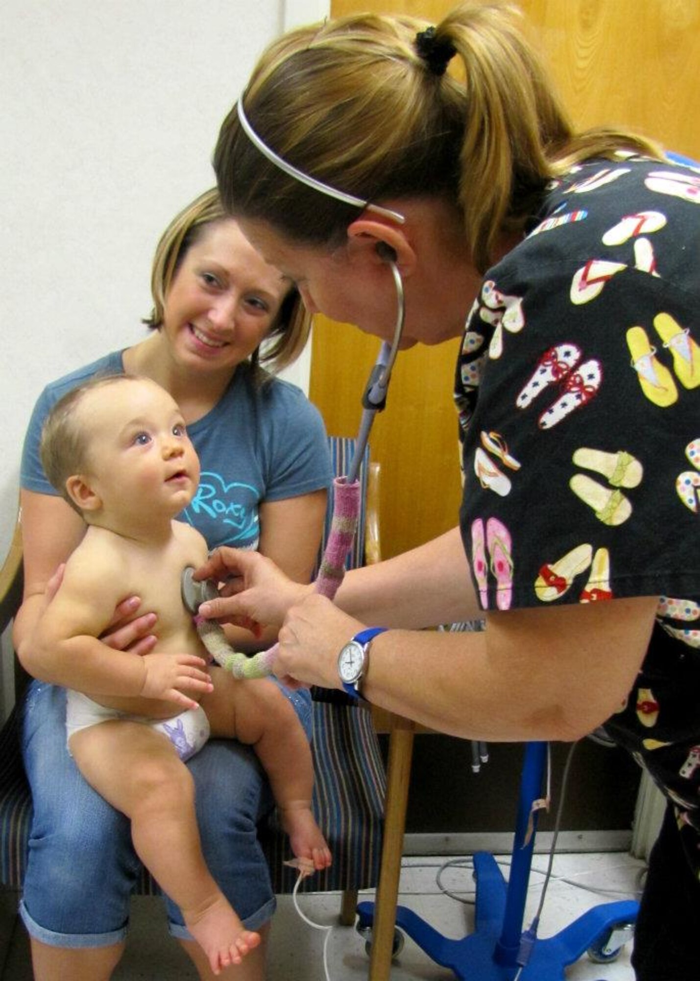 During a recent visit to the McDonald Army Health Center, Sabrina O’Kane brings her son, Soren, into the Pediatrics Clinic for a routine check-up.  Pediatrics is one of four primary care clinics that will offer Patient Centered Medical Home services -- a new model of healthcare that has been adopted throughout the military healthcare system. (Courtesy photo by Marlon Martin/Released)