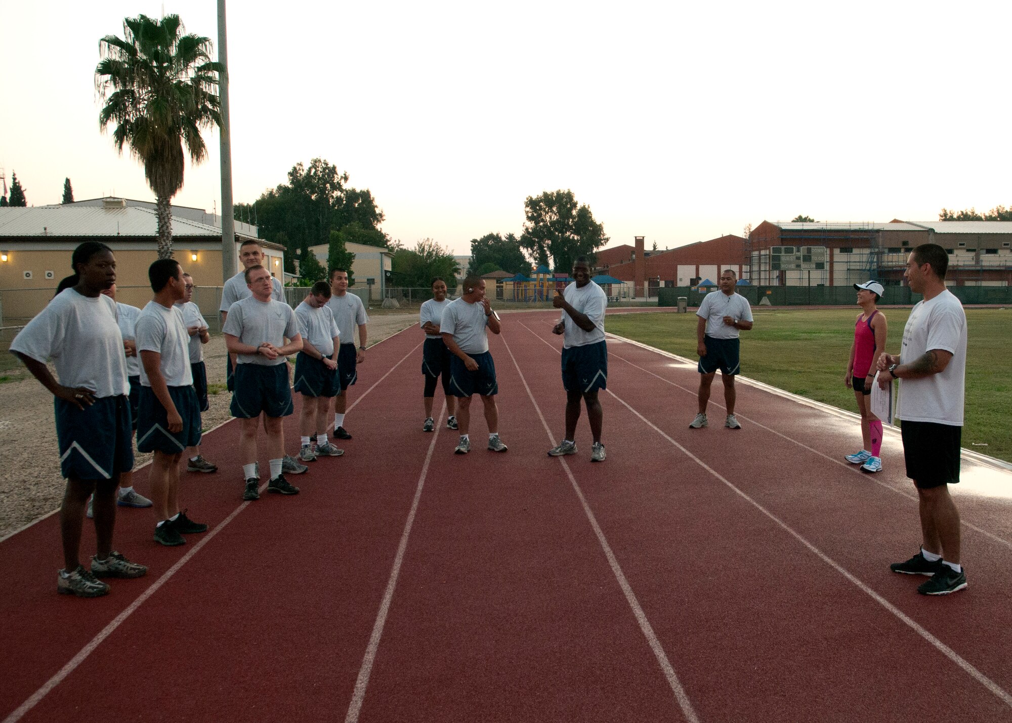 Team Incirlik Airmen gather at the track for a running class hosted by the 39th Medical Group that is designed to help them decrease their run time Aug. 28, 2012, Incirlik Air Base, Turkey. The class is designed to help those who have scored lower than 45 on the cardiovascular portion of their fitness assessment test improve their run time. (U.S. Air Force photo by Senior Airman Daniel Phelps/ Released)