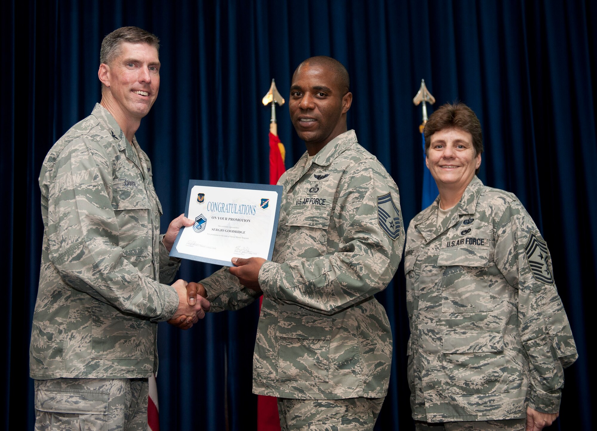 Sergio Goodridge, 728th Air Mobility Squadron, is promoted to the rank of senior master sergeant Aug. 31, 2012, at the club complex ballroom at Incirlik Air Base, Turkey. (U.S. Air Force photo by Senior Airman Clayton Lenhardt/Released)