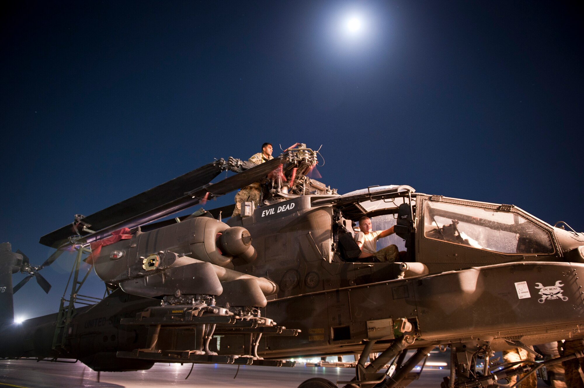 Soldiers prepare to load a U.S. Army AH-64 Apache attack helicopter aboard a U.S. Air Force C-5B Galaxy at Bagram Airfield, Afghanistan Aug. 30, 2012. A joint team of Bagram Aerial Porters, West Virginia Air Guardsmen, and U.S. Army Soldiers worked seamlessly to transport dozens of rotary wing aircraft and thousands of pounds of equipment in and out of Afghanistan as the 101st Combat Aviation Brigade replaced the redeploying 82nd Combat Aviation Brigade. (U.S. Air Force Photo/Capt. Raymond Geoffroy)
