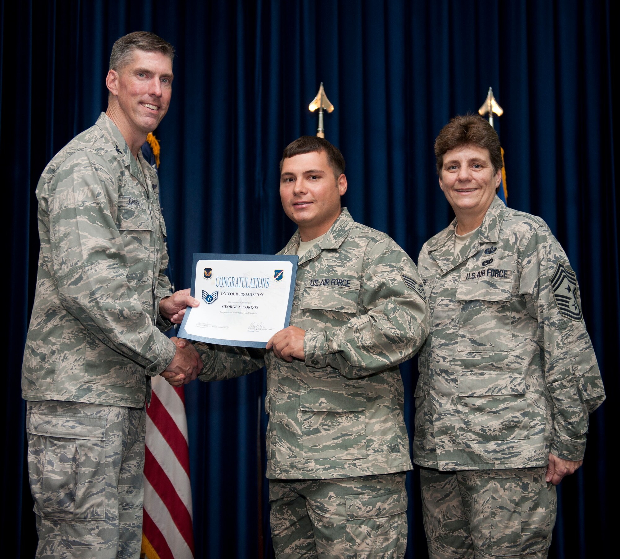 George Korkos, 728th Air Mobility Squadron, is promoted to the rank of staff sergeant Aug. 31, 2012, at the club complex ballroom at Incirlik Air Base, Turkey. (U.S. Air Force photo by Senior Airman Clayton Lenhardt/Released)