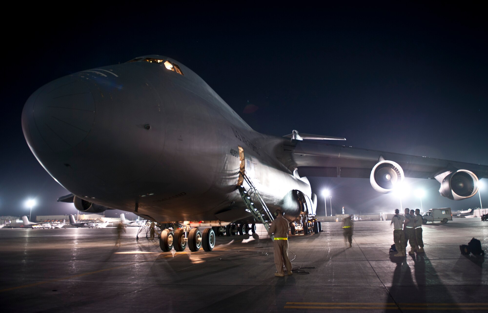 A U.S. Air Force C-5B Galaxy is parked on the ramp at Bagram Airfield, Afghanistan Aug. 30, 2012. Relying on the massive Galaxy, a joint team of Bagram Aerial Porters, West Virginia Air Guardsmen, and U.S. Army Soldiers worked seamlessly to transport dozens of rotary wing aircraft and thousands of pounds of equipment in and out of Afghanistan as the 101st Combat Aviation Brigade replaced the redeploying 82nd Combat Aviation Brigade. (U.S. Air Force Photo/Capt. Raymond Geoffroy)