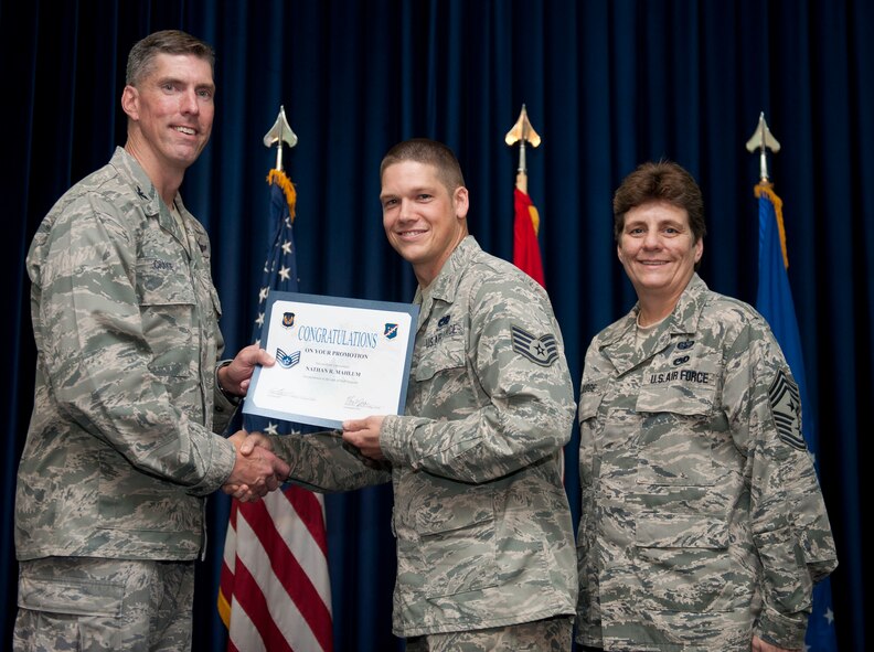 Nathan Mahlum, 39th Maintenance Squadron, is promoted to the rank of staff sergeant Aug. 31, 2012, at the club complex ballroom at Incirlik Air Base, Turkey. (U.S. Air Force photo by Senior Airman Clayton Lenhardt/Released)