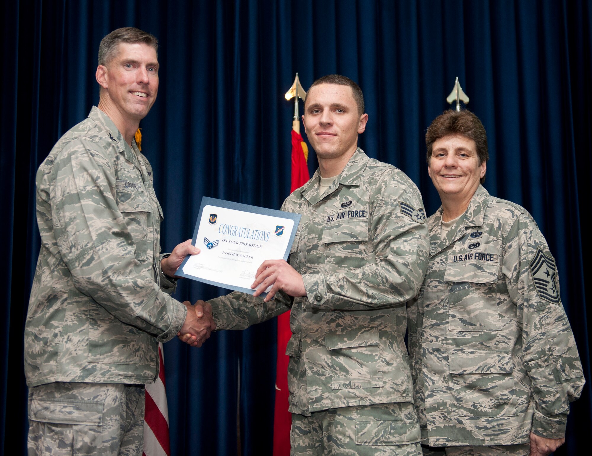 Joseph Sadler, 39th Communications Squadron, is promoted to the rank of senior airman Aug. 31, 2012, at the club complex ballroom at Incirlik Air Base, Turkey. (U.S. Air Force photo by Senior Airman Clayton Lenhardt/Released)