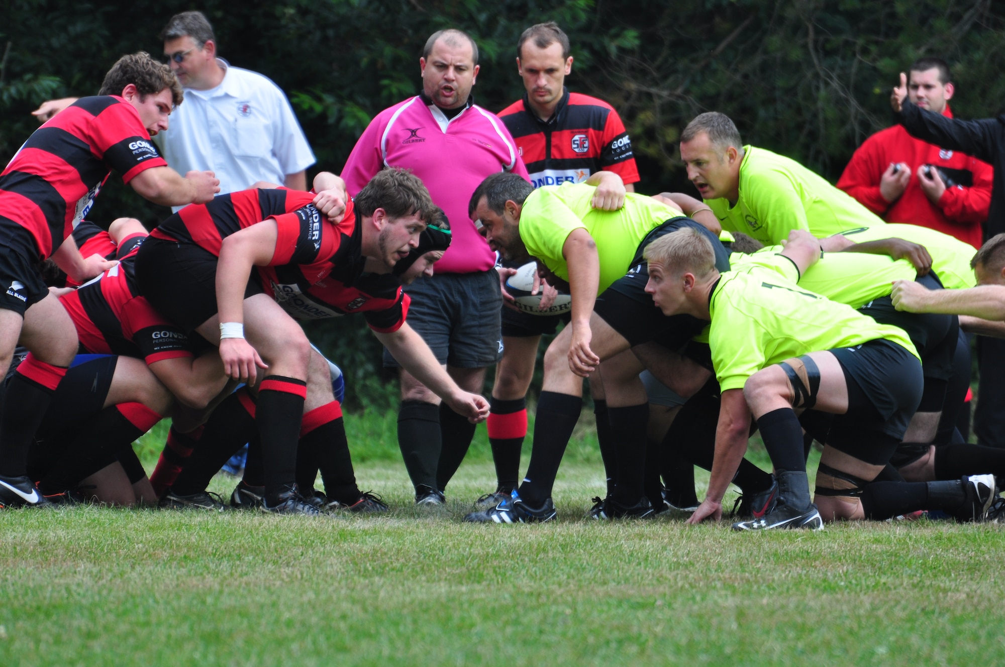 Frankfurt 1880 (left) and The Ramstein Rogues line up for a “scrum” during a Division-II home-opener rugby match at the Queidersbach SportPlatz Sept. 1, 2012. The Rogues won the match 31-17. (U.S. Air Force photo/Tech. Sgt. Chad Thompson)
