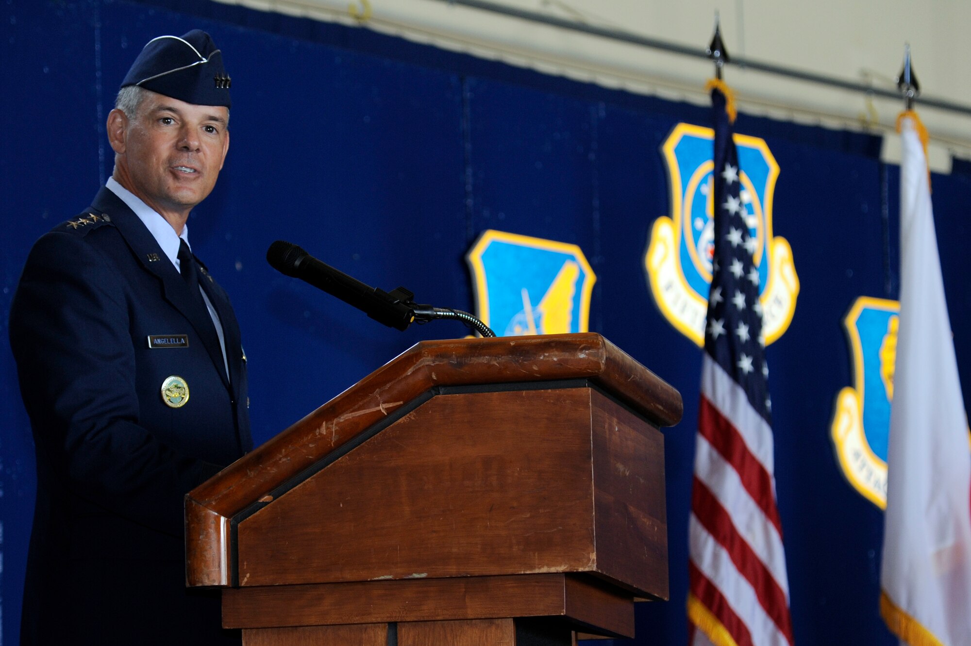 U.S. Air Force Lt. Gen. Sam Angelella, U.S. Forces, Japan and 5th Air Force commander, gives opening remarks during the wing change of command ceremony at Misawa Air Base, Japan, Sept. 4, 2012. A change of command is a military tradition representing a formal transfer of authority and responsibility for a unit from one commanding officer to another. (U.S. Air Force photo by Tech. Sgt. Marie Brown)
