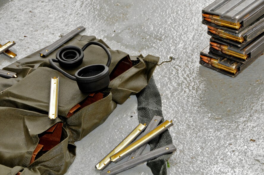 ANDERSEN AIR FORCE BASE, Guam -- Ammunition is loaded in magazines before Airmen start live fire exercises for training here Aug. 28. The Combat Arms Training and Maintenance mission is to ensure that all weapons utilized by 36th Wing personnel are functional, maintained and ready when the Airmen are called to duty. (U.S. Air Force photo by Airman 1st Class Marianique Santos/Released)