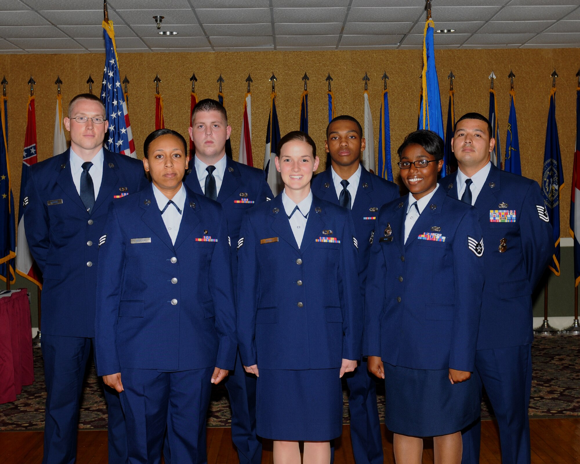 Seven of Team BLAZE’s newly promoted enlisted Airmen were promoted at the enlisted promotions ceremony at the Columbus Club on Aug. 30. (U.S. Air Force photo/Melissa Doublin)