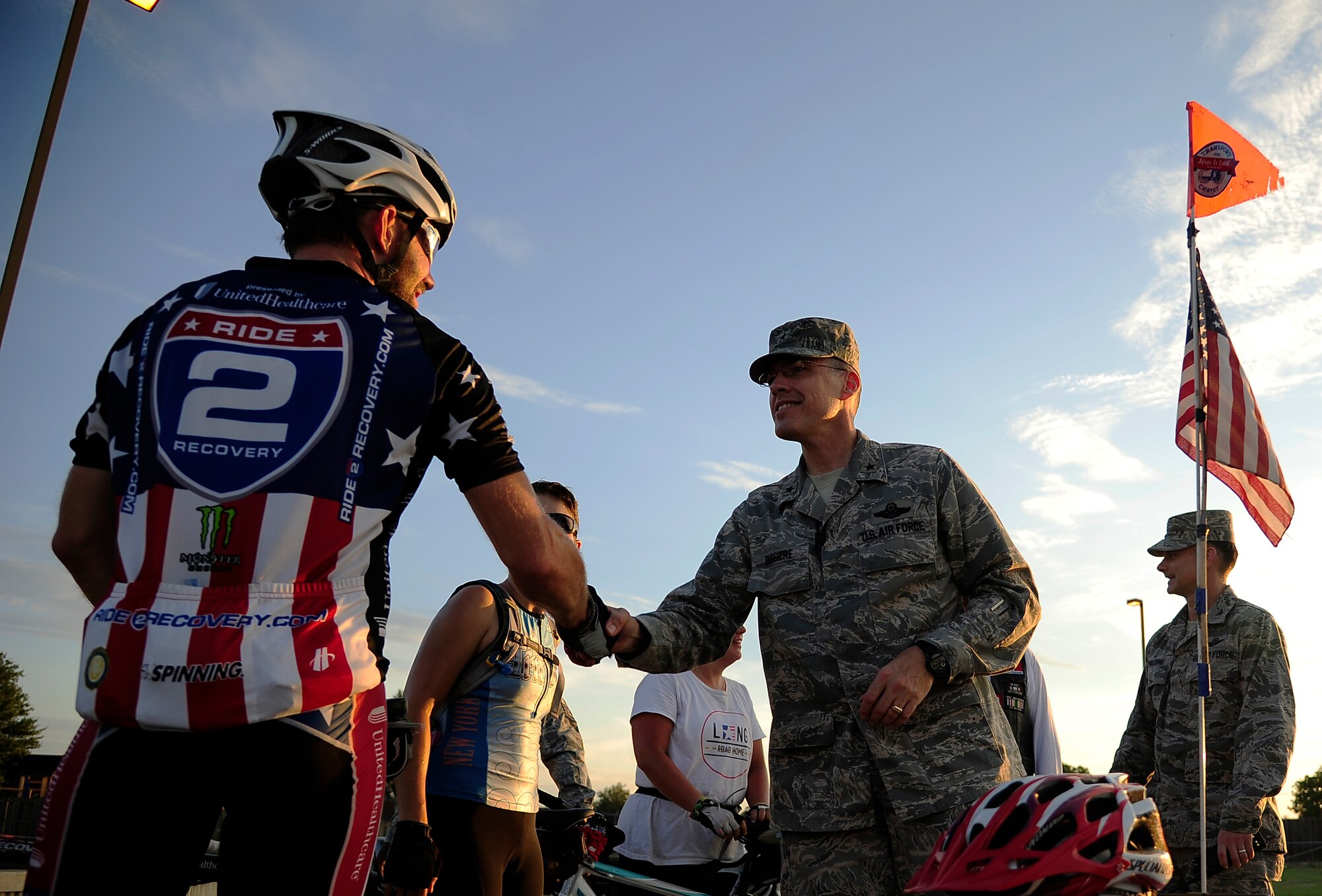 Brig. Gen. Thomas Bussiere, 509th Bomb Wing commander, greets Ryan Creel, a medically retired Army Staff Sgt. and official rider for the Long Road Home Project, as the riders end their 93-mile ride from Kansas City to Whiteman Air Force Base, Mo., Sept. 4.  The Long Road Home Project consists of five prior service members riding 4,200 miles across the country in hopes of bringing awareness to the fact that hundreds of thousands of service people often face difficulty returning home. (U.S. Air Force photo/Senior Airman Cody H. Ramirez)



