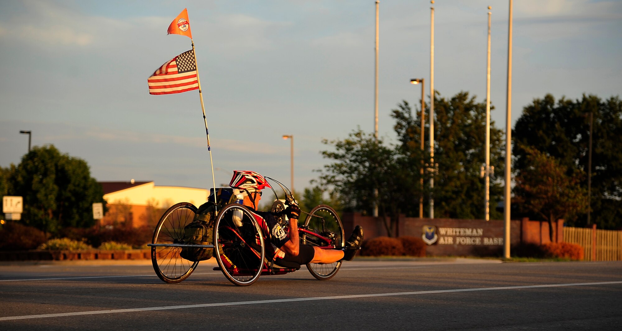 Steven Taylor, 59 year-old prior Air Force service member and an official rider for the Long Road Home Project, nears Whiteman Air Force Base, Mo., Sept. 4, ending his day's 93-mile ride from Kansas City. The Long Road Home Project consists of five prior service members riding 4,200 miles across the country in hopes of bringing awareness to the fact that hundreds of thousands of service people often face difficulty returning home.  Similar to the overall goal of Long Road Home, Taylor is riding across the nation to inspire veterans and civilians alike to never give up.  (U.S. Air Force photo/Senior Airman Cody H. Ramirez)


