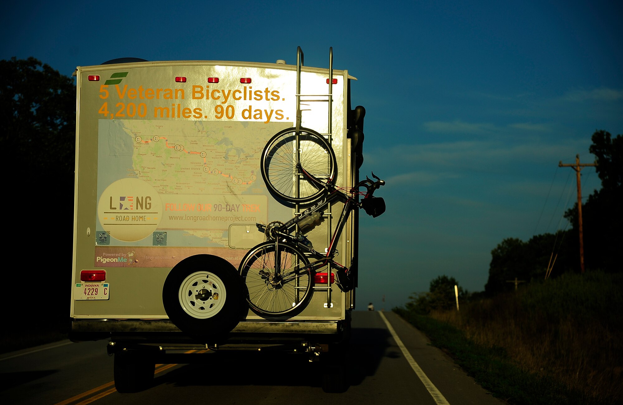 The Long Road Home Project trailer straggles behind five riders as they head for Whiteman Air Force Base, Mo., Sept. 4. The trailer stays behind to provide relief or transport in case of an emergency. The Long Road Home Project consists of five prior service members riding 4,200 miles across the country in hopes of bringing awareness to the fact that hundreds of thousands of service people often face difficulty returning home. (U.S. Air Force photo/Senior Airman Cody H. Ramirez)

