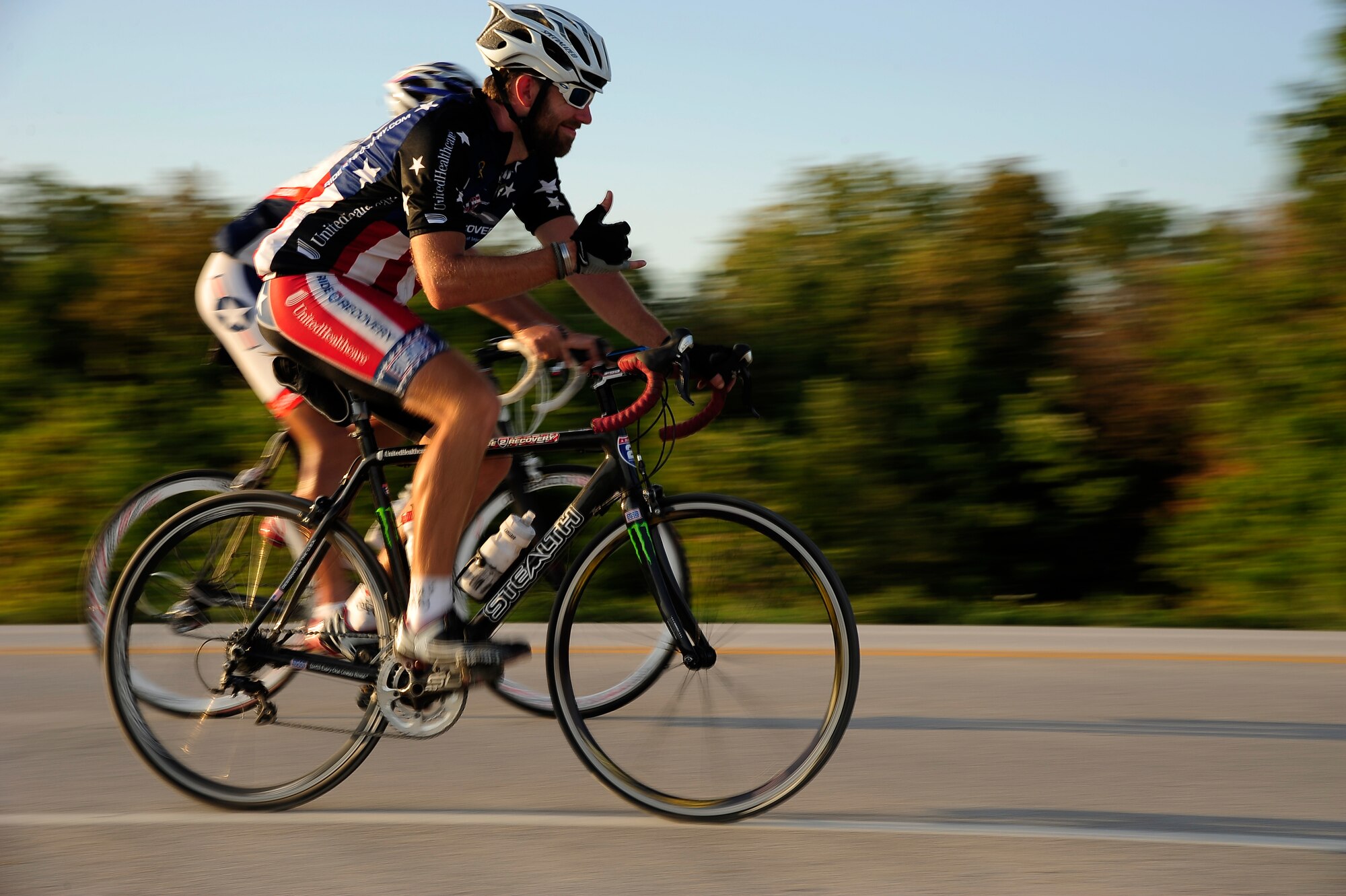 Ryan Creel, a medically retired Army Staff Sgt., and Master Sgt. Andrew Chocha, ride toward Whiteman Air Force Base, Mo., as part of the Long Road Home Project Sept. 4. Chocha, stationed out of Barksdale Air Force Base, took advantage of a temporary deployment to ride with the group 93 miles from Kansas City to Whiteman. The Long Road Home Project consists of five prior service members riding 4,200 miles across the country in hopes of bringing awareness to the fact that hundreds of thousands of service people often face difficulty returning home. (U.S. Air Force photo/Senior Airman Cody H. Ramirez)