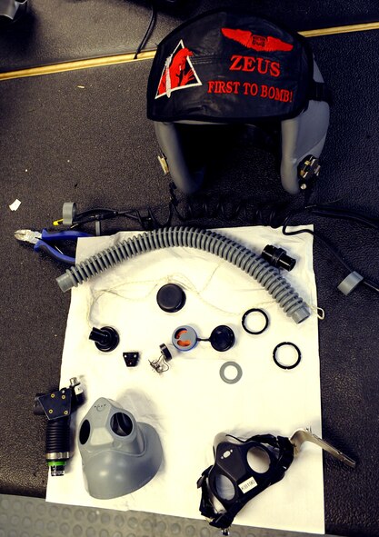 A disassembled aircrew helmet lays on a table on Barksdale Air Force Base, La., Sept. 5. The helmet is disassembled by Airmen from the 2nd Operations Support Squadron aircrew flight equipment in order to be cleaned. The Airmen also ensure nothing is broken or cracked. (U.S. Air Force photo/Airman 1st Class Benjamin Gonsier)(RELEASED)
