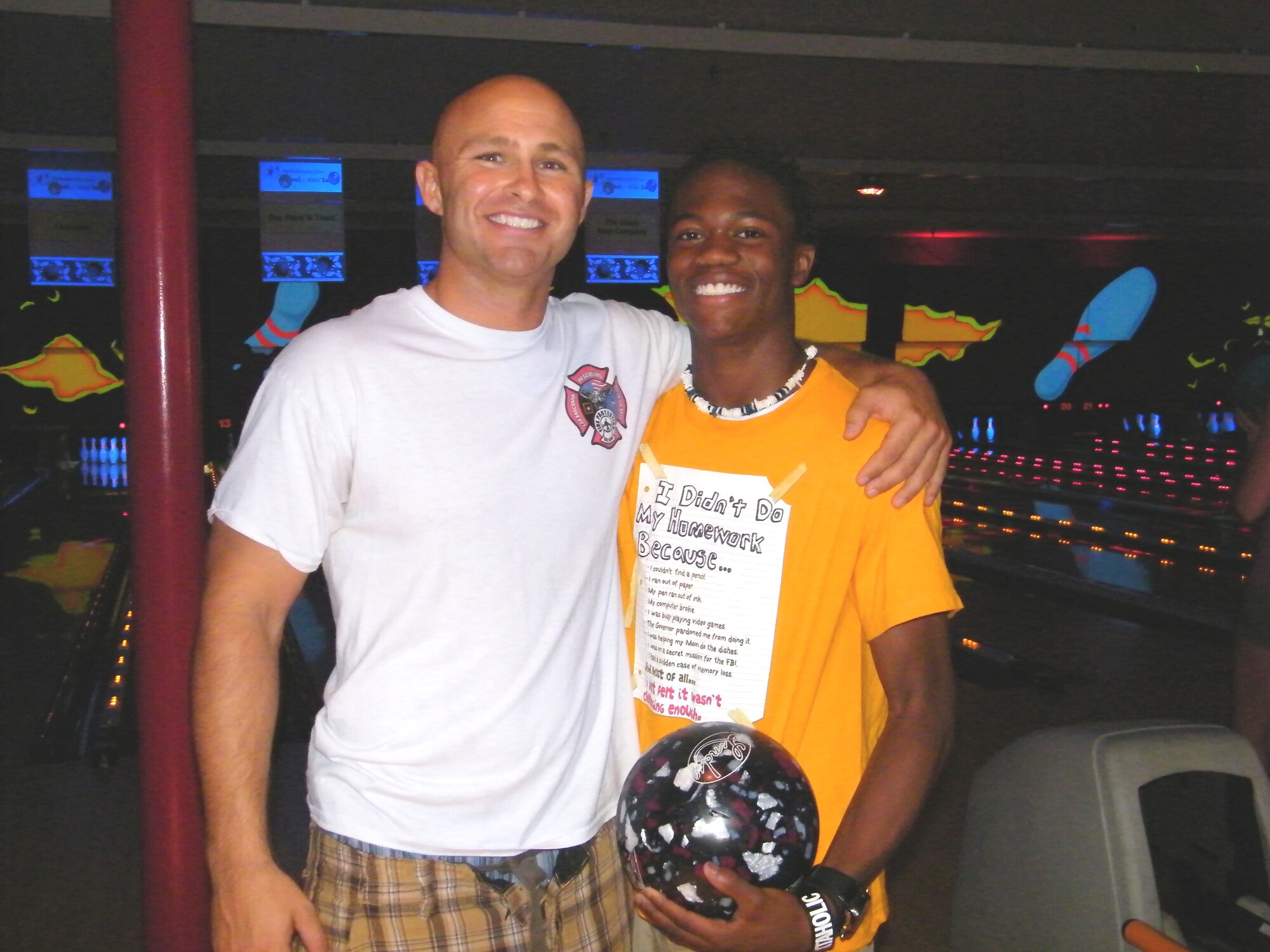 Staff Sgt. Will Wailgum, 325th Civil Engineer firegither and his 'Little Brother'  take a break from bowling to pose for a picture. Sergeant Wailgum has been a part of the Big Brother Big Sister program for over two years. (Courtesy Photo)
