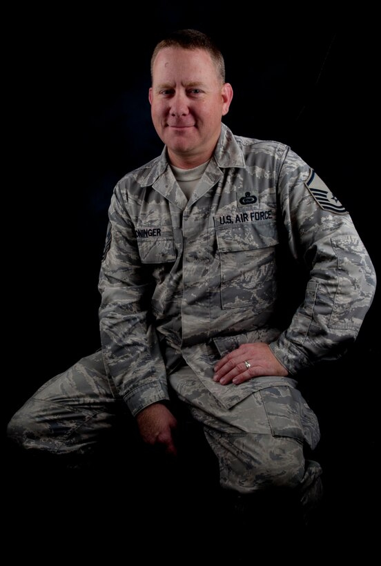 U.S Air Force Master Sgt. Casey Moninger, Warner Robins Air Logistics Center Detachment 1 superintendent of distributable ground systems experimental analysis, serves on active-duty, married to another active-duty spouse. Throughout their marriage, they have been apart a total of four years. (U.S. Air Force photo by Senior Airman Stephanie Rubi / Released) 