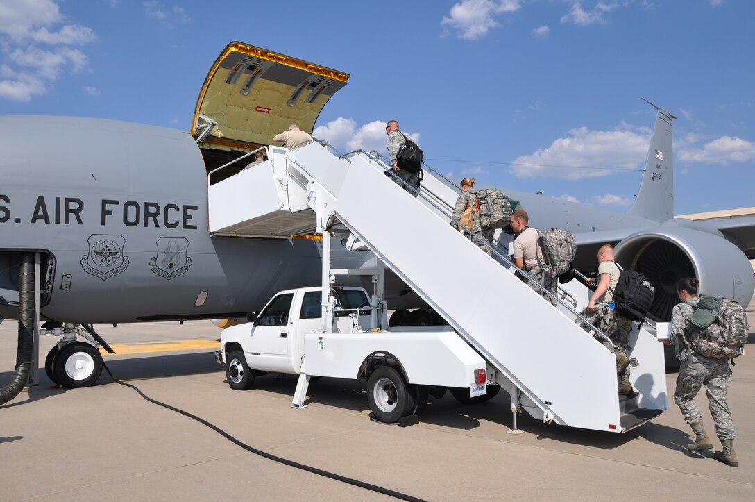 Deploying members of the Air Force Reserve 931st Air Refueling Group board a KC-135 Stratotanker at McConnell Air Force Base, Kan.  The Citizen Airmen have deployed to Southwest Asia in support of ongoing U.S. operations overseas.  (U.S. Air Force photo by 1st Lt. Zach Anderson)