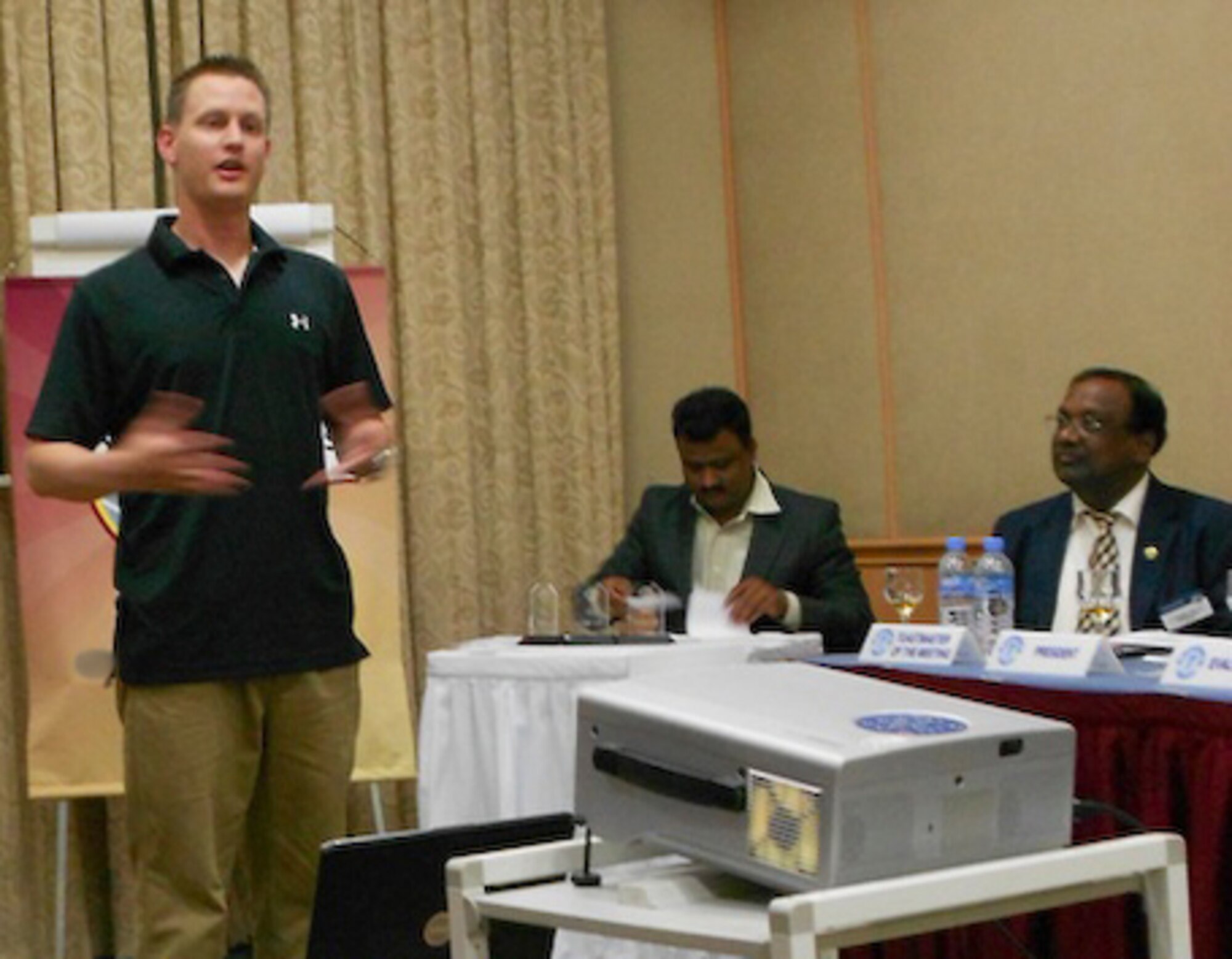 Staff Sgt. Nathan Peterson, Combined Air Operations Center information assurance manager and Desert Falcon toastmaster, gives a speech about 'success' during the first combined toastmasters meeting with the host nation club. According to the official mission statement, Toastmasters International helps men and women learn the arts of speaking, listening and thinking – vital skills which promote self-actualization, enhance leadership potential, foster human understanding and contribute to the betterment of mankind. (Courtesy photo)