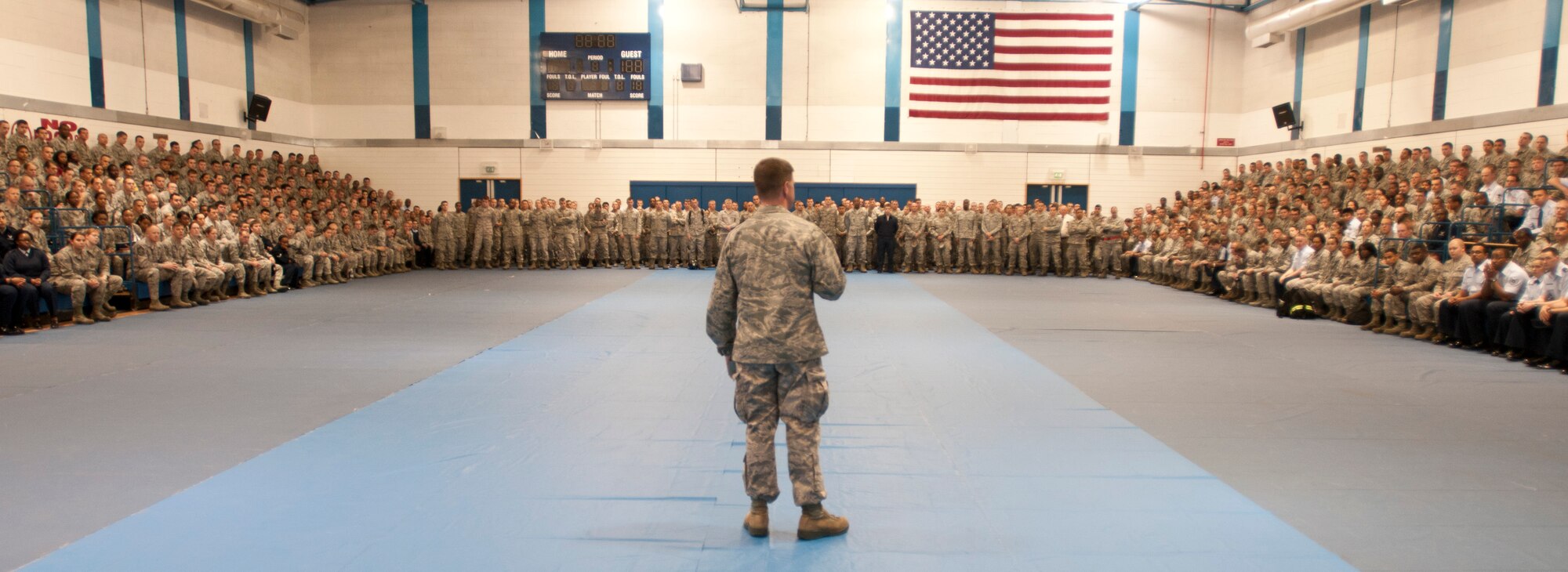ROYAL AIR FORCE LAKENHEATH, England – Col. Kyle Robinson, 48th Fighter Wing commander, addresses Liberty Wing Airmen during a commander’s call at Hangar 7 Aug. 27, 2012. Robinson covered current wing issues and answered questions during the call. (U.S. Air Force photo by Staff Sgt. Stephen Linch)