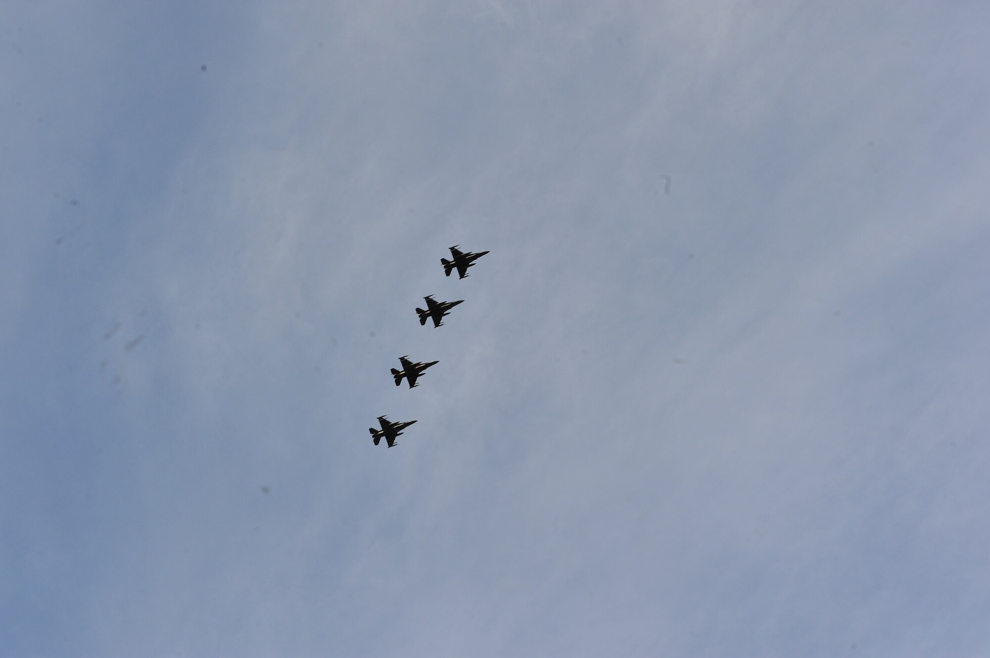 KALLAX AIR BASE, Sweden -- A four-ship formation of F-16 Fighting Falcon aircraft from the 480th Fighter Squadron  fly overhead here Sept. 3, in support of the Nordic Air Meet 2012. The multinational training exercise brought together more than 50 aircraft from the United States, United Kingdom, Denmark, Finland, Switzerland and Sweden to participate in tactical role-playing training missions. The three week exercise enabled the different nations to exchange aerial tactics and capabilities to improve combat power effectiveness in solo and joint environments while building and strengthening international partnerships. (U.S. Air Force Photo by Airman 1st Class Dillon Davis/Released)