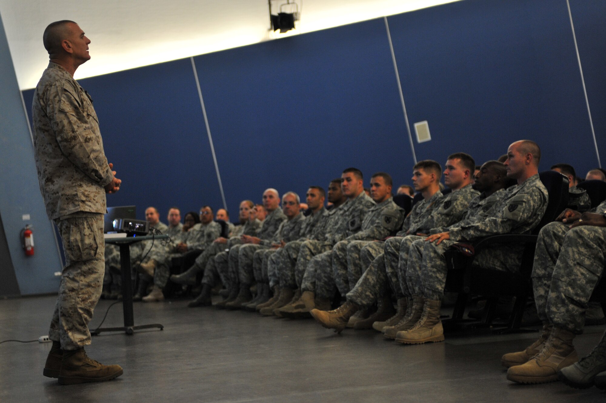 Sgt. Maj. Bryan Battaglia, Senior Enlisted Advisor to the Chairman of the Joint Chiefs of Staff, speaks with Airman and Soldiers during a joint enlisted call on Vogelweh, Germany, Sept. 4, 2012. This visit gave the Kaiserslautern Military Community the opportunity to show Battaglia the strategic contributions of the joint forces within the KMC. (U.S. Air Force/Senior Airman Caitlin O’Neil-McKeown)