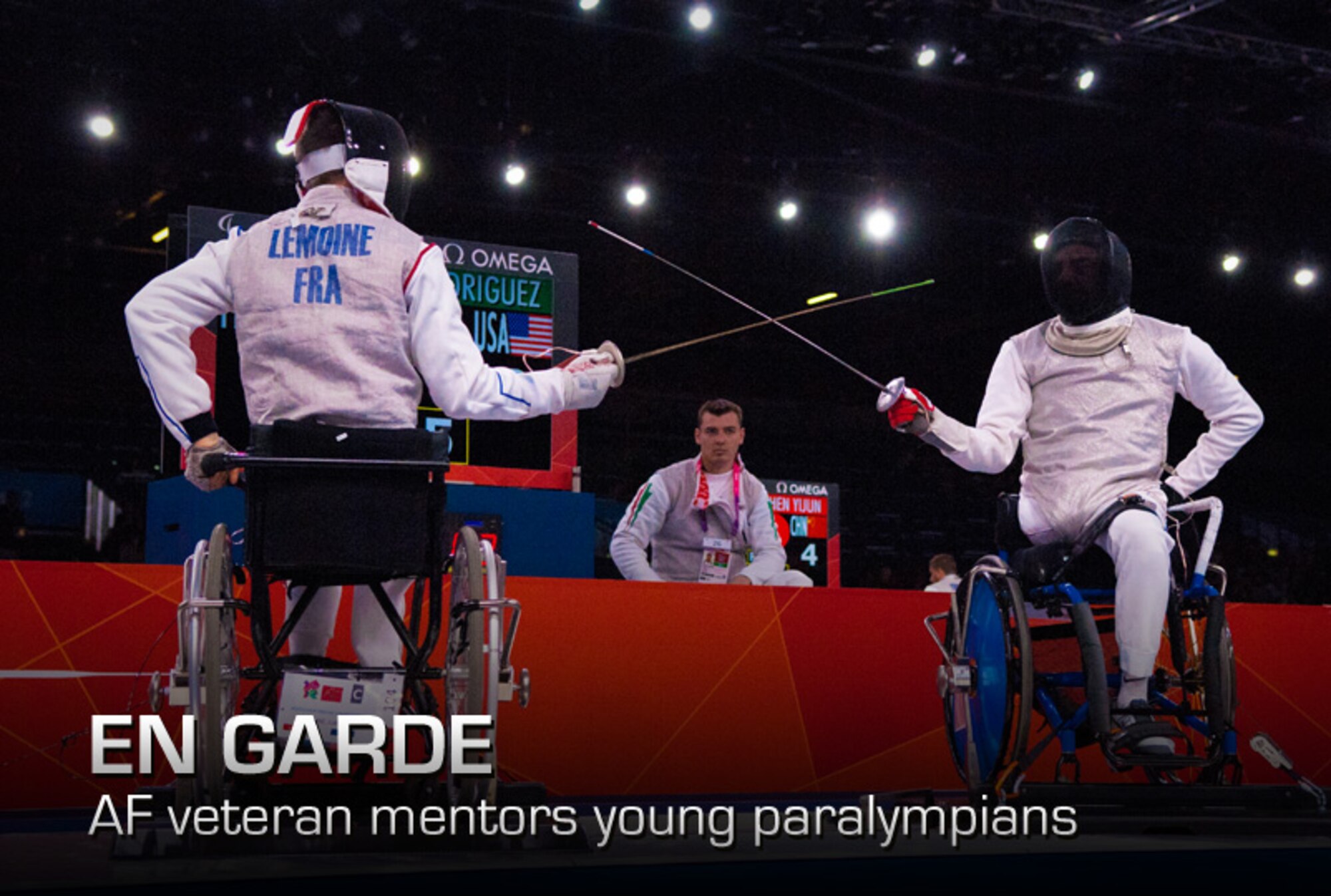 Former Air Force Staff Sgt. Mario Rodriguez, right, a member of the 2012 U.S. Paralympic fencing team, squares off with France's Ludov LeMoine during the Paralympic Games in London, on Sept. 4, 2012. Rodriguez elected to have his leg removed in 1992 after an untreatable tumor was discovered. (Department of Defense photo/Sgt. 1st Class Tyrone C. Marshall Jr.)