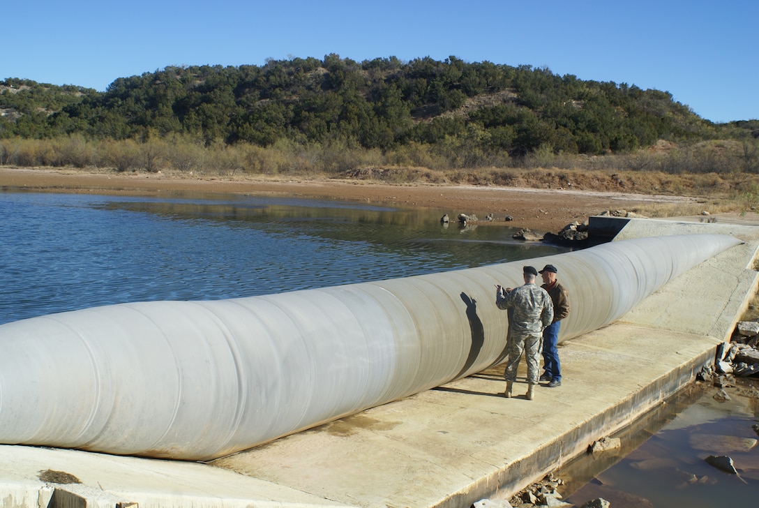 The inflatable dam at the Bateman pump station is used when there is low flows in the river. The dam pools up salt water from salt water springs. From the pooling area, the salt water is pumped 22 miles to Truscott Brine Lake. 