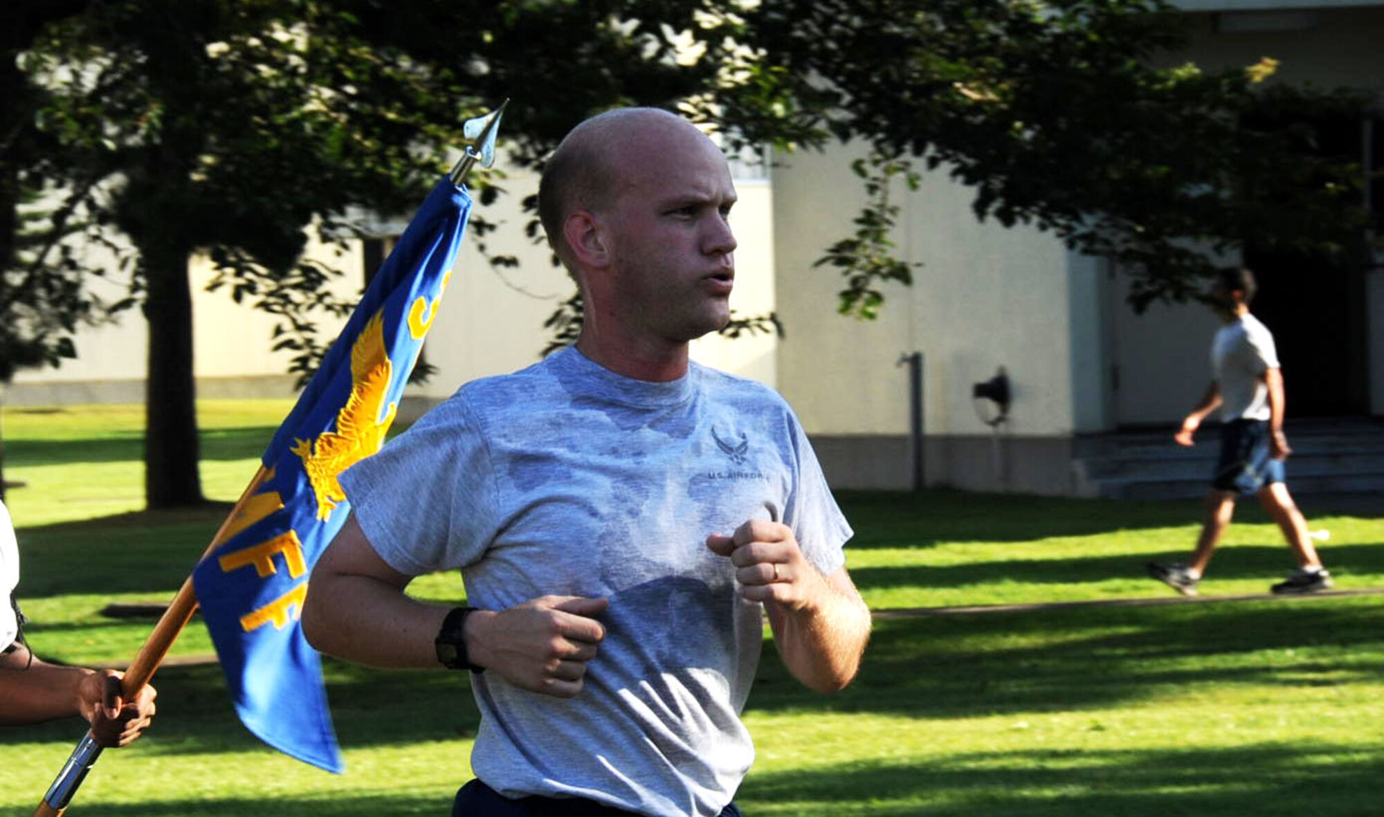 U.S. Air Force Staff Sgt. Stephen Ocenosak, 35th Fighter Wing Public Affairs video NCO in charge, makes his way to the finish line during a monthly readiness run at Misawa Air Base, Japan, Sept. 7, 2012. The run is a way for the American and Japanese military to strengthen their bilateral relationship and promote physical fitness. (U.S. Air Force photo by Airman 1st Class Kenna Jackson/Released)