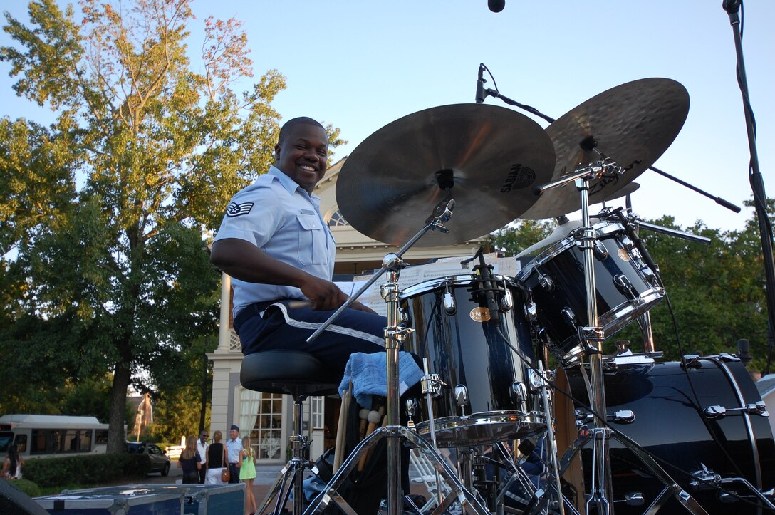 USAF Rhythm In Blue Jazz Ensemble on stage for an outdoor concert in Williamsburg, Virginia.