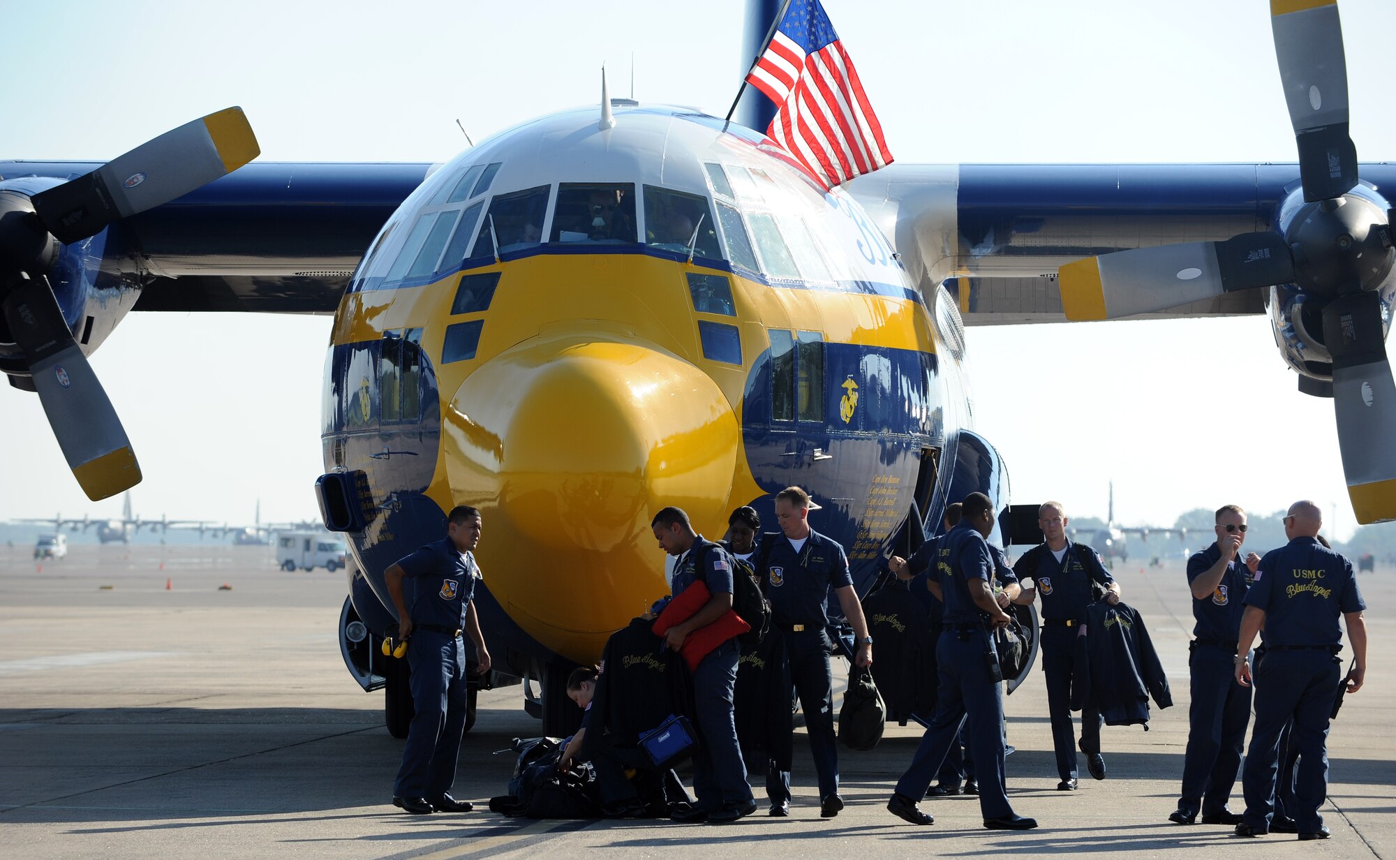 U.S. Marine Corps crew members unload Fat Albert Sept. 6, 2012, Little Rock Air Force Base, Ark. The Fat Albert aircrew consists of three officers and five enlisted personnel, all members of the U.S. Marine Corps. (U.S. Air Force photo by Staff Sgt. Jessica Condit)