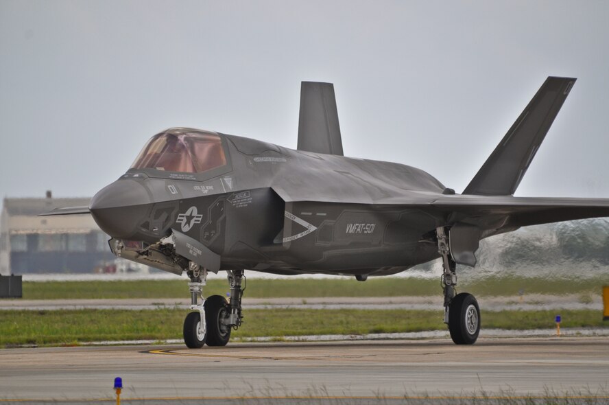 Marine Corps Maj. Tye Bachmann, of the Marine Fighter Attack Squadron 501, completed the 100th sortie of the F-35B variant of the Lightning II Aug. 31 at Eglin Air Force Base, Fla. The flight was a lineup of six aircraft returning to the skies on the first day of flying after Hurricane Isaac. The 100th B variant sortie is another marker that the F-35 team is progressing forward in sortie generations and maintenance training as the aircraft systems continue to mature.  (U.S. Air Force photo/Maj. Karen Roganov)
