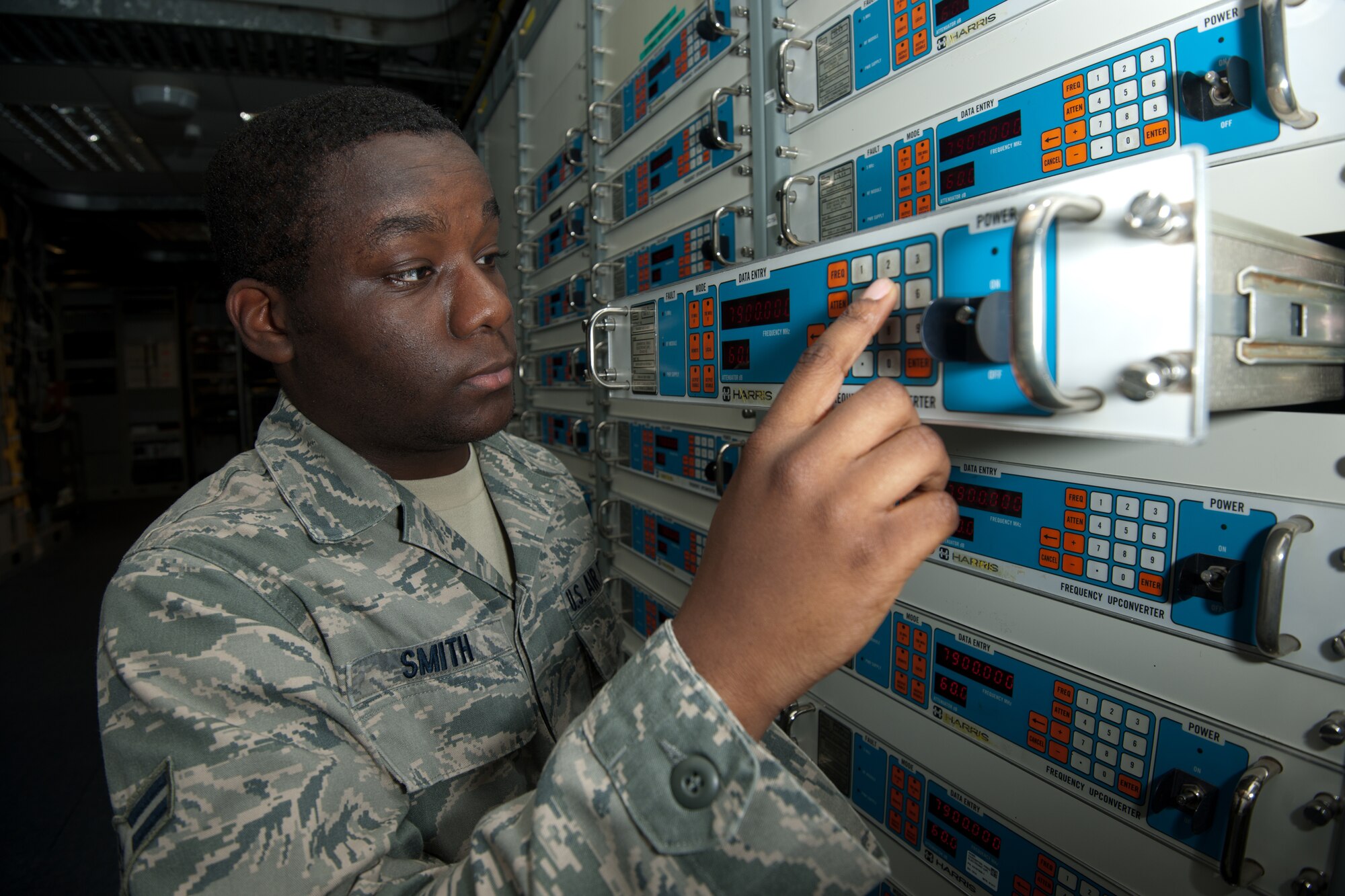 RAF CROUGHTON, United Kingdom – Airman 1st Class Anthony Smith, 422nd Communications Squadron satellite communications, performs preventative maintenance on equipment at RAF Croughton Sept. 5. The 422nd CS provides global communications capabilities in support of U.S. and NATO objectives. (U.S. Air Force photo by Master Sgt. John Barton)