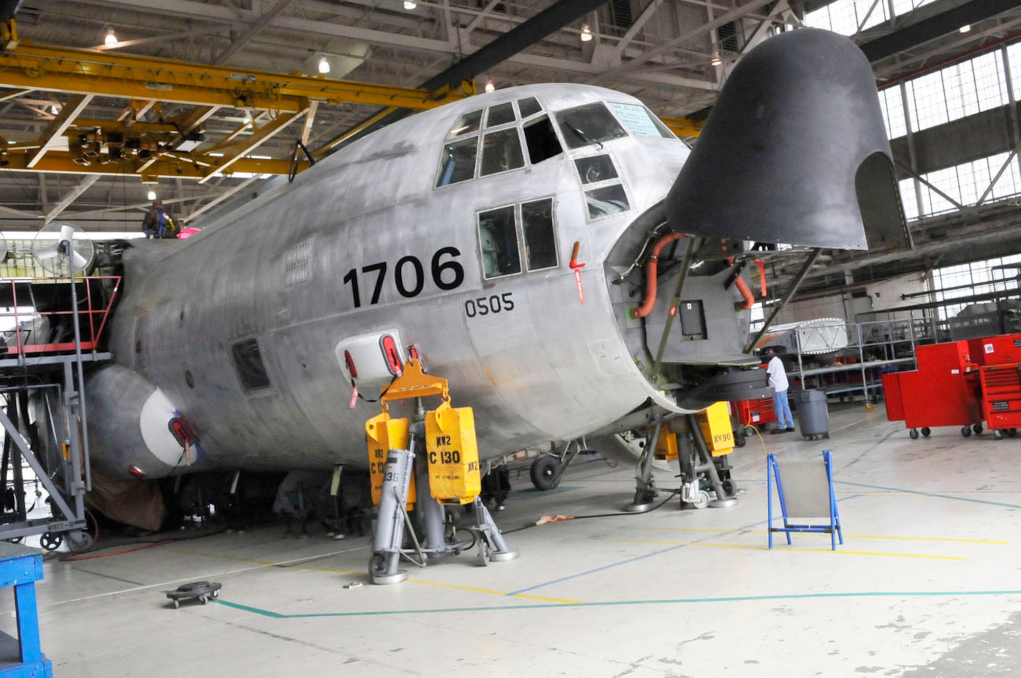 A Coast Guard C-130 undergoes maintenance at Warner Robins Air Logistics Center, Robins Air Force Base, Ga.  The ALC's C-130 Programmed Depot Maintenance team was awarded the Robert T. Mason Depot Maintenance Excellence Award for outstanding achievement in weapon system and military equipment maintenance.. (U. S. Air Force photo by Sue Sapp)