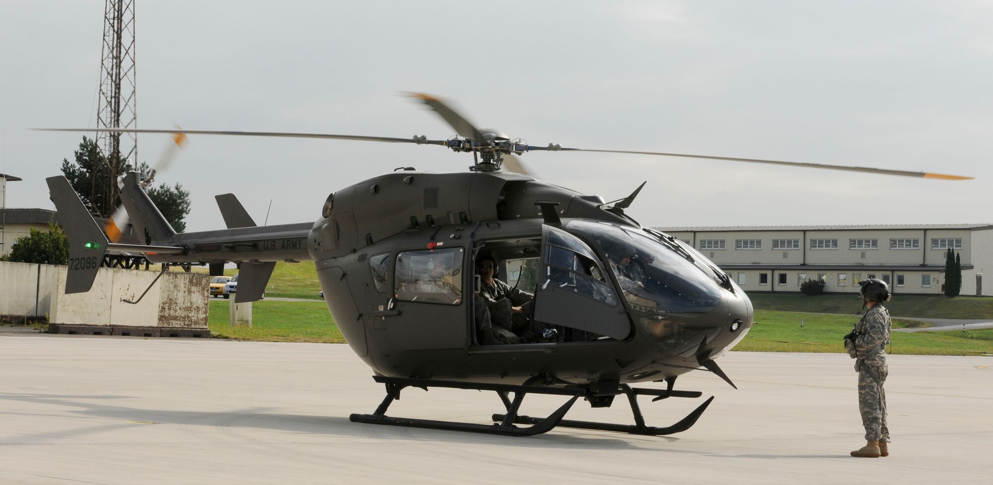 SPANGDAHLEM AIR BASE, Germany -- U.S. Army UH-72 Lacota helicopter pilots prepare for takeoff from the flightline here Sept. 5.  Joint terminal attack controllers and the helicopter pilots visited with the 81st Fighter Squadron here to exchange close-air-support tactics techniques and procedures. During their visit, they flew in an A-10 Thunderbolt II simulator, viewed the inside of an A-10 cockpit and viewed target information sent from ground forces to the A-10 pilots. The 81st FS shares and exchanges operating procedures with joint forces to ensure interoperability in future training exercises and contingency operations.  (U.S. Air Force photo by Senior Airman Natasha Stannard/Released)