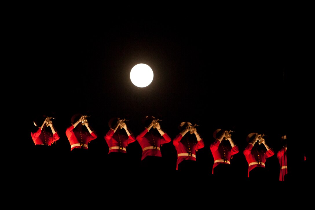 U.S. Marine Drum & Bugle Corps buglers perform atop the ramparts during a Friday Evening Parade at Marine Barracks Washington Aug. 31.