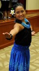 A "Na Kamali`i O Iliahi" hula dancer from the Iliahi Elementary School in Wahiawa performing at the 11th Anniversary of the Joint Venture Education Forum Annual Meeting, held at the Ford Island Conference Center, Ford Island, Hawaii Aug. 30, 2012. The JVEF mission is to provide continuous coordination through partnerships and open dialogue, in order to promote an understanding of and implement initiatives to address the needs of military children and families and to facilitate support for Hawaii's public school students. (U.S. Air Force photo/Tech. Sgt. Jerome S. Tayborn)