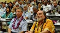 Gen. Herbert J. “Hawk” Carlisle, Pacific Air Forces commander, and Governor Neil Abercrombie watched school presentations at the 11th Joint Venture Education Forum Annual Meeting at the Ford Island Conference Center, Ford Island, Hawaii, Aug. 30, 2012. The JVEF mission is to provide continuous coordination through partnerships and open dialogue, in order to promote an understanding of and implement initiatives to address the needs of military children and families and to facilitate support for Hawaii's public school students. (U.S. Air Force photo/Tech. Sgt. Jerome S. Tayborn)