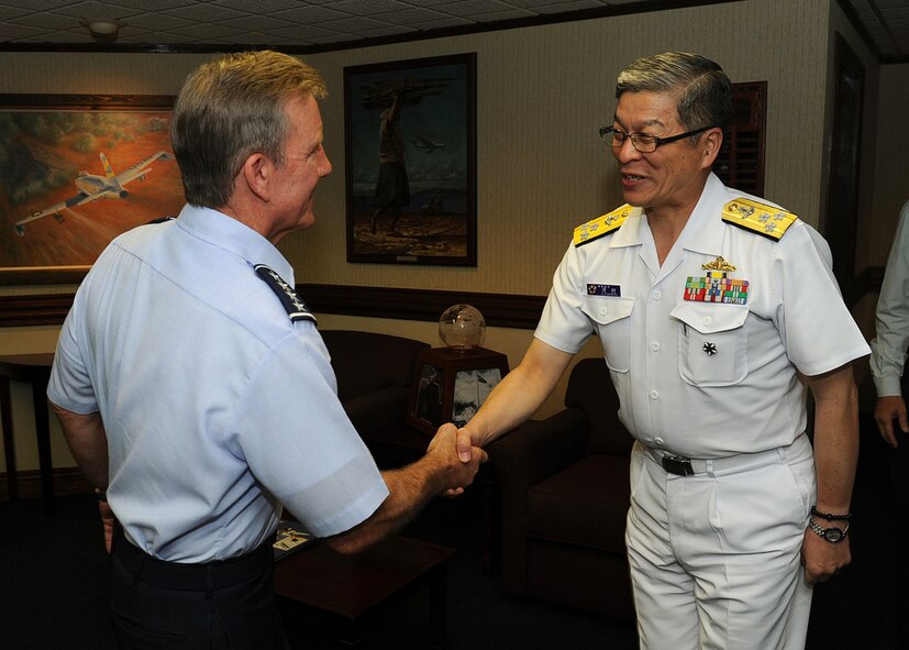Gen. Herbert J. “Hawk” Carlisle, Pacific Air Forces commander, greets Vice Admiral Masao Kawamura, Japan Joint Staff/J3, at PACAF headquarters, Joint Base Pearl Harbor-Hickam, Hawaii, Sept. 4, 2012. Kawamura visited PACAF to help strengthen the important relationship between the U.S. and Japan. (U.S. Air Force photo/Tech. Sgt. Jerome S. Tayborn)