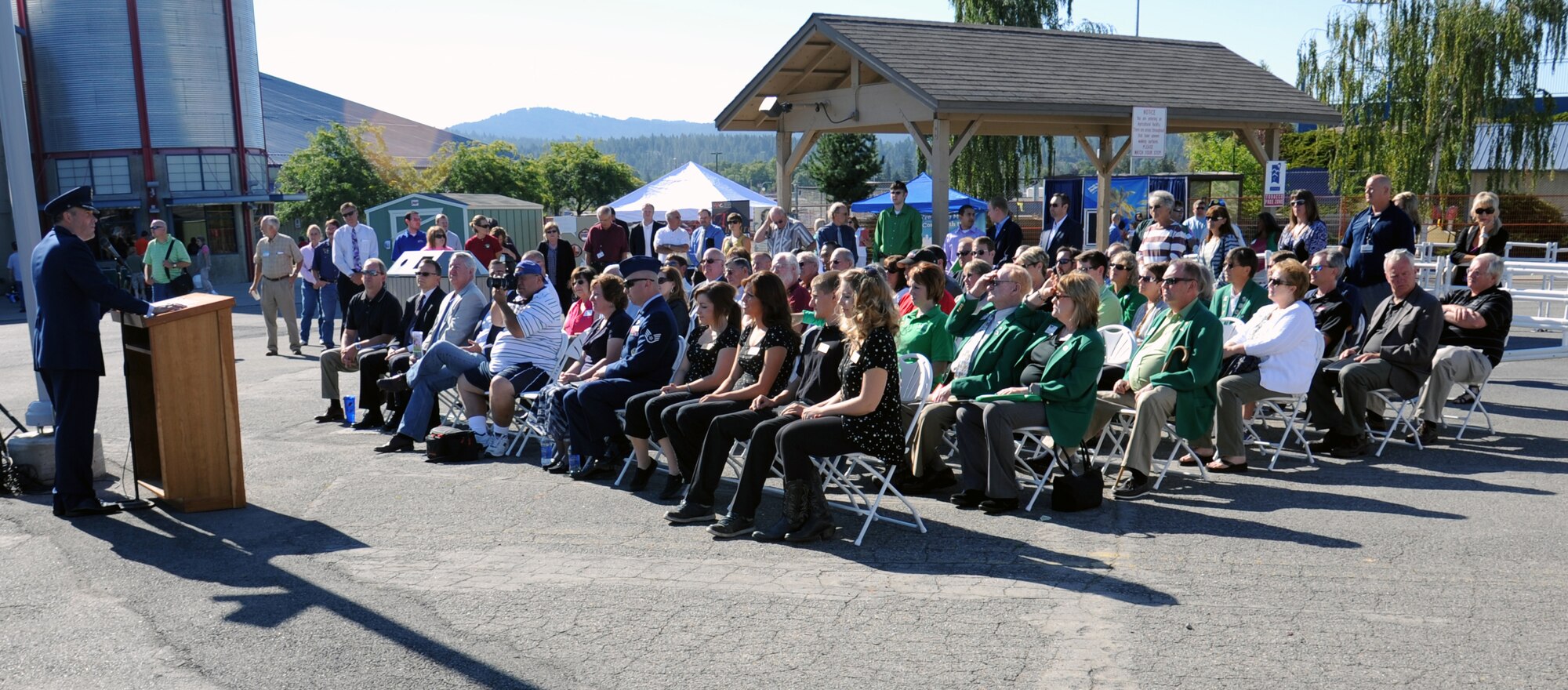 Col. Brian Newberry, 92nd Air Refueling Wing commander, addresses a crowd of nearly 100 Eastern Washington residents during the opening ceremonies for the 61st Annual Spokane County Interstate Fair in Spokane, Wash., Sept. 7, 2012. The colonel talked about the importance of U.S. servicemembers both down range and at home station and thanked everyone for their support of Fairchild’s Airmen. (U.S. Air Force photo by Senior Airman Benjamin Stratton)