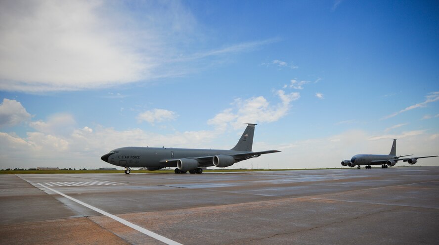 McConnell KC-135 Stratotankers participate in an “elephant walk” formation as they taxi down a runway during an operational readiness exercise Sept. 7, 2012, McConnell Air Force Base, Kan. The exercise showcased McConnell aircrews’ capability to prepare a flight and take off within minutes of being notified of a mission. (U.S. Air Force photo/Airman 1st Class Jose L. Leon)