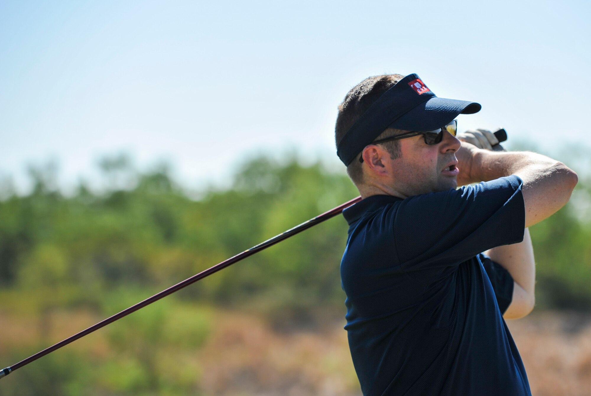 SAN ANGELO, Texas--Lt. Col. Scott Nahrgang, 316th Training Squadron Commander, watches his ball in the air during the 2012 Friendship Golf Tournament at Quicksand Golf Course Sept. 7. The event was hosted by the San Angelo Chamber of Commerce to help raise funds for the First Sergeant's Council to support Operation Warmheart and other base-wide programs that support service members and their families during deployments and emergencies. (U.S. Air Force Photo /Airman 1st Class Michael Smith)