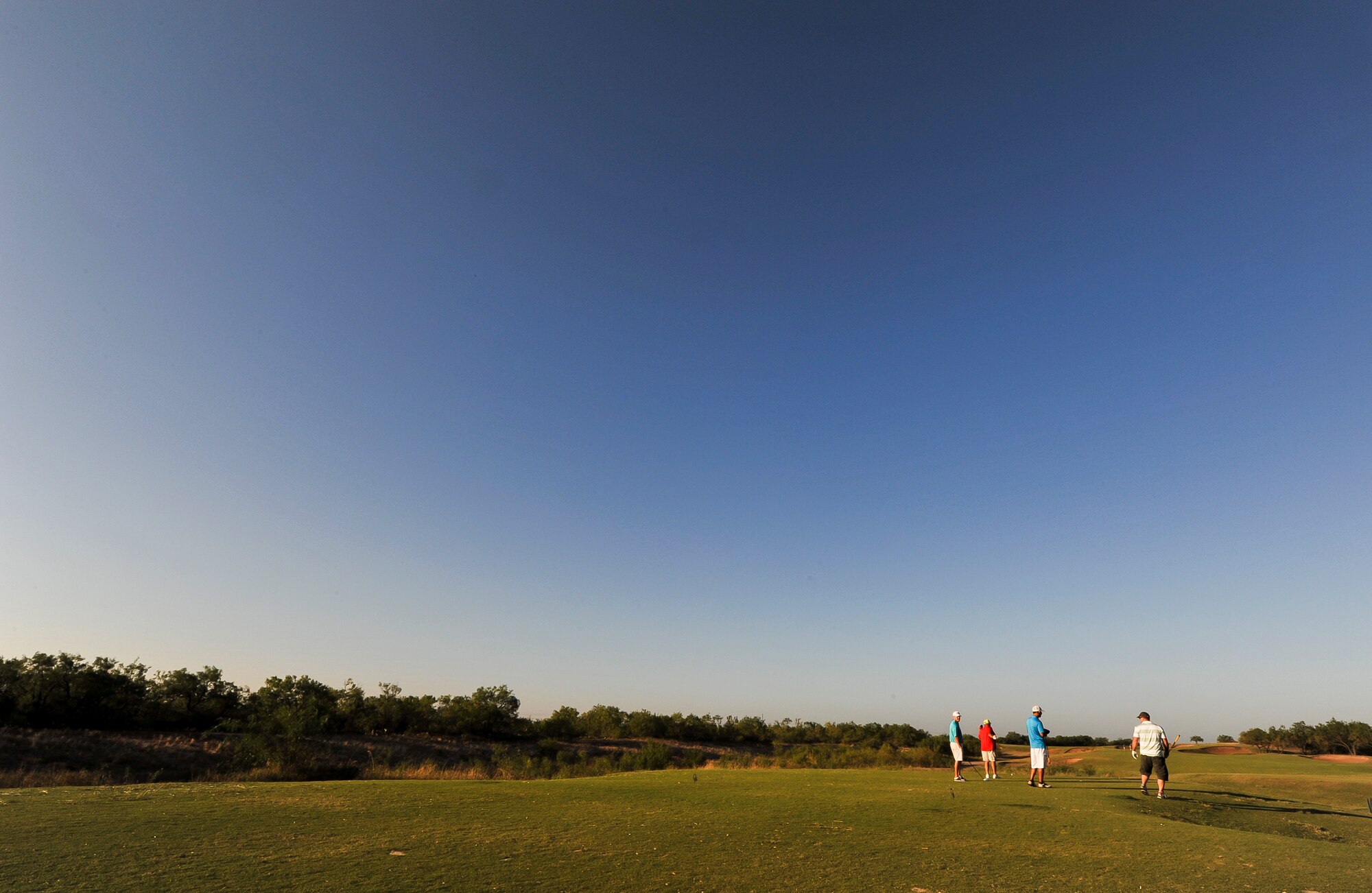 SAN ANGELO, Texas--Participants of the 2012 Friendship Golf Tournament prepare to tee-off at Quicksand Golf Course Sept. 7. The event was hosted by the San Angelo Chamber of Commerce to help raise funds for the First Sergeant's Council to support Operation Warmheart and other base-wide programs that support service members and their families during deployments and emergencies. (U.S. Air Force Photo /Airman 1st Class Michael Smith)