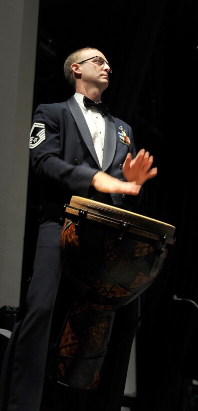 Senior Master Sgt. Dennis Hoffmann, U.S. Air Force Band member, beats the djembe during a performance with the U.S. Air Force Concert Band and Singing Sergeants at the Bowie Center fot he Performing Arts in Bowie, Md., Aug. 29, 2012.  (U.S. Air Force photo/Staff Sgt. Torey Griffith)
