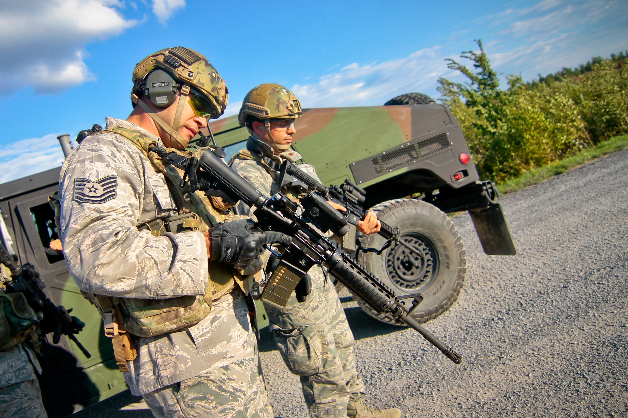 A picture of U.S. Air Force Airmen from the 227th Air Support Operations Squadron training with weapons