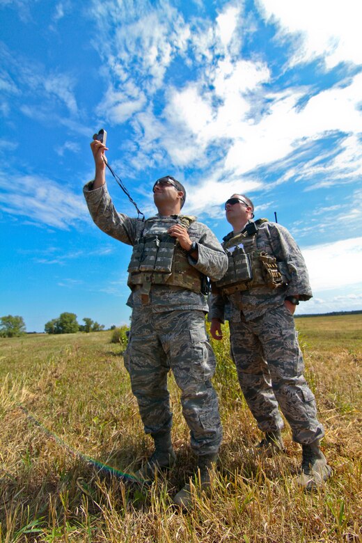 A picture of U.S. Air Force Airmen from the 227th Air Support Operations Squadron receiving training on drop zone procedures.