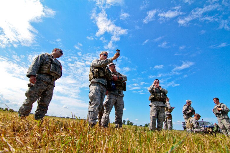 A picture of U.S. Air Force Airmen from the 227th Air Support Operations Squadron receiving training on drop zone procedures.