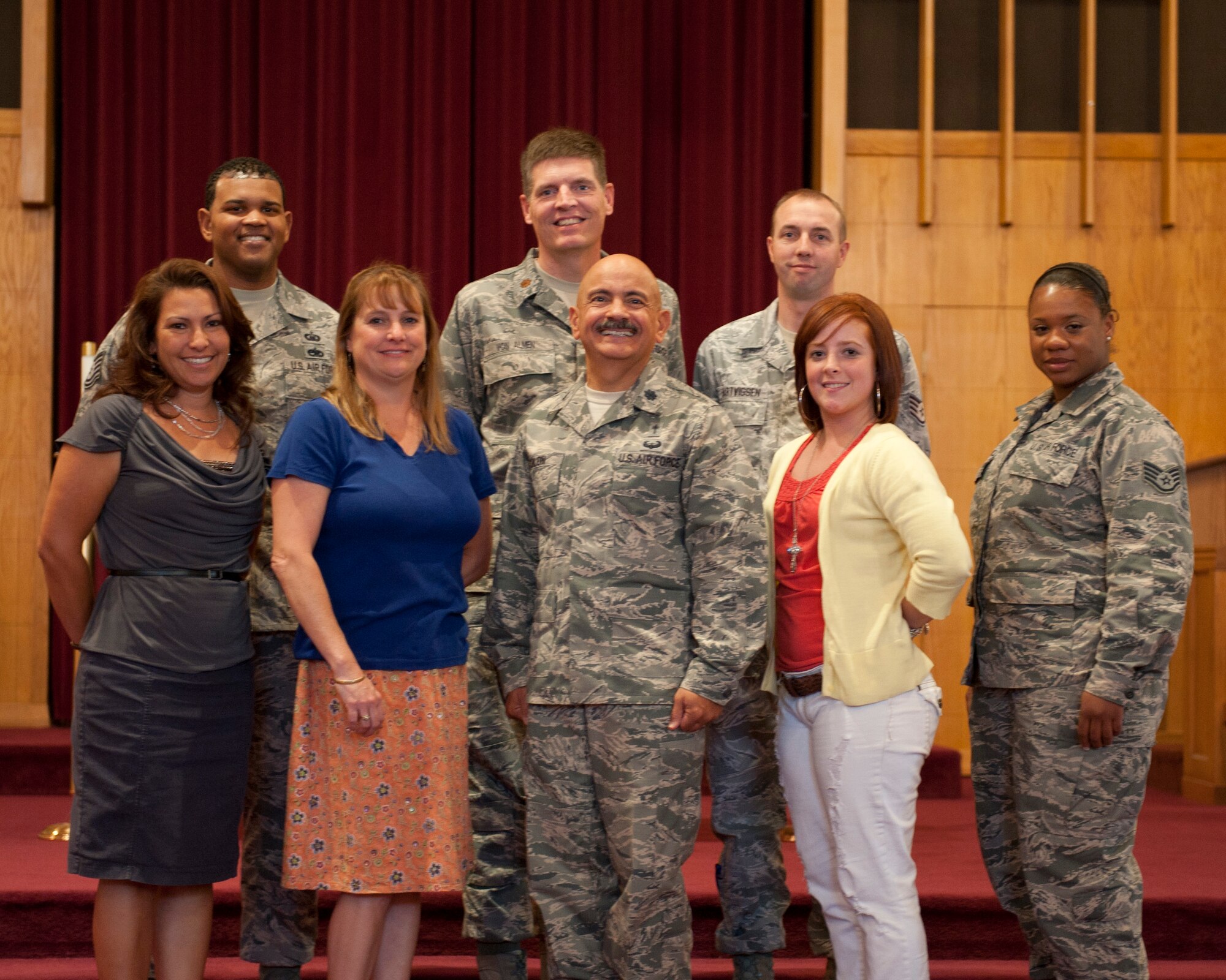 The staff of the 49th Wing Chapel stands inside the chapel on Holloman Air Force Base, N.M., Sept. 5. The Holloman AFB chapel offers counseling for all Airmen with a policy of 100 percent confidentiality. The chapel strives to ensure that the spiritual needs of all Airmen are met. (U.S. Air Force photo by Airman 1st Class Daniel E. Liddicoet/Released)