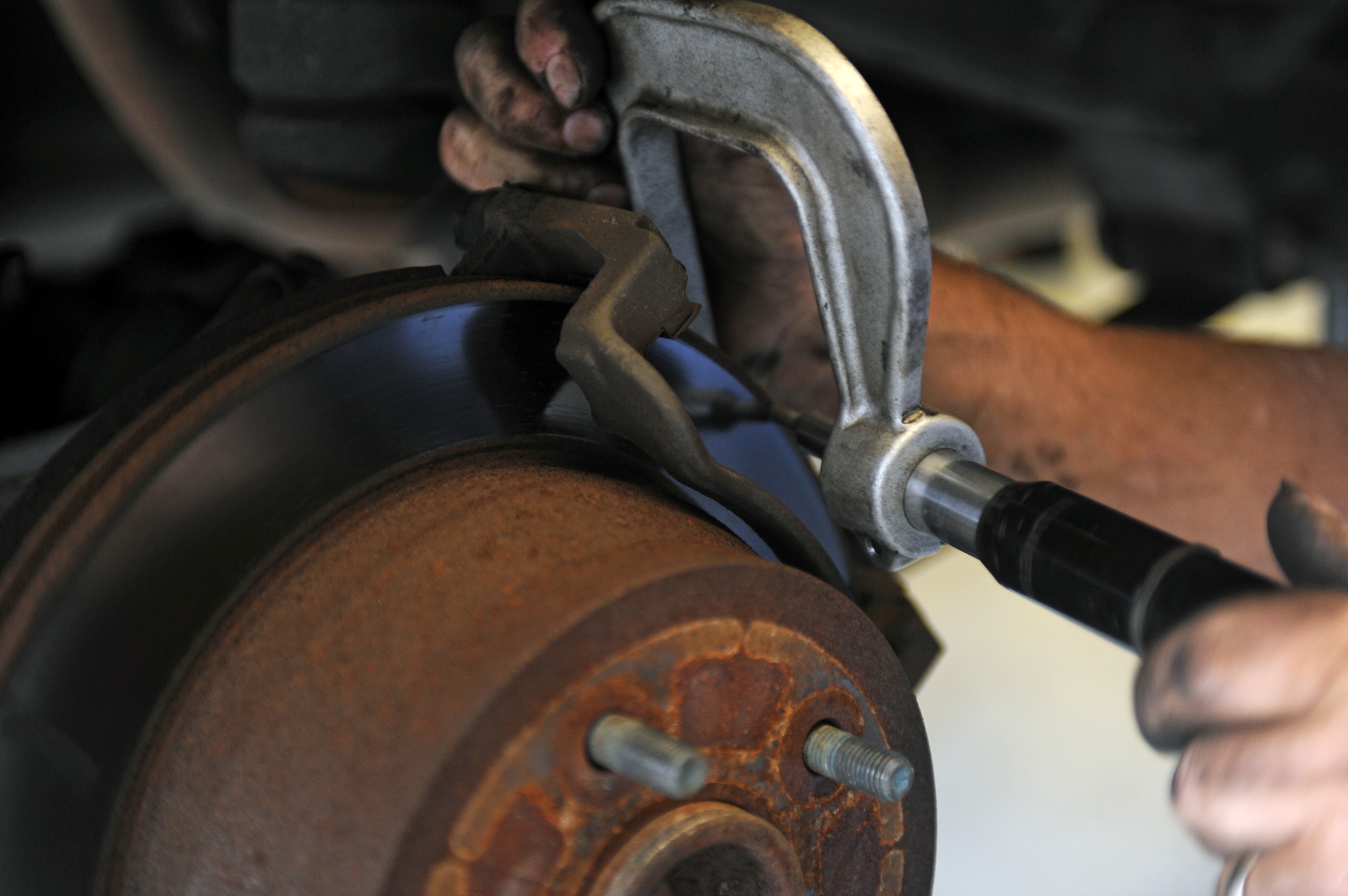 Jerry Cazeault, 4th Force Support Squadron mechanic, uses a micrometer to measure the rotor thickness of a car at the Auto Hobby Shop on Seymour Johnson Air Force Base, N.C., Sept. 6, 2012. A micrometer is an instrument used for precise measurements of small objects, varying in depth, length or thickness. (U.S. Air Force photo/Airman 1st Class John Nieves Camacho/Released)
