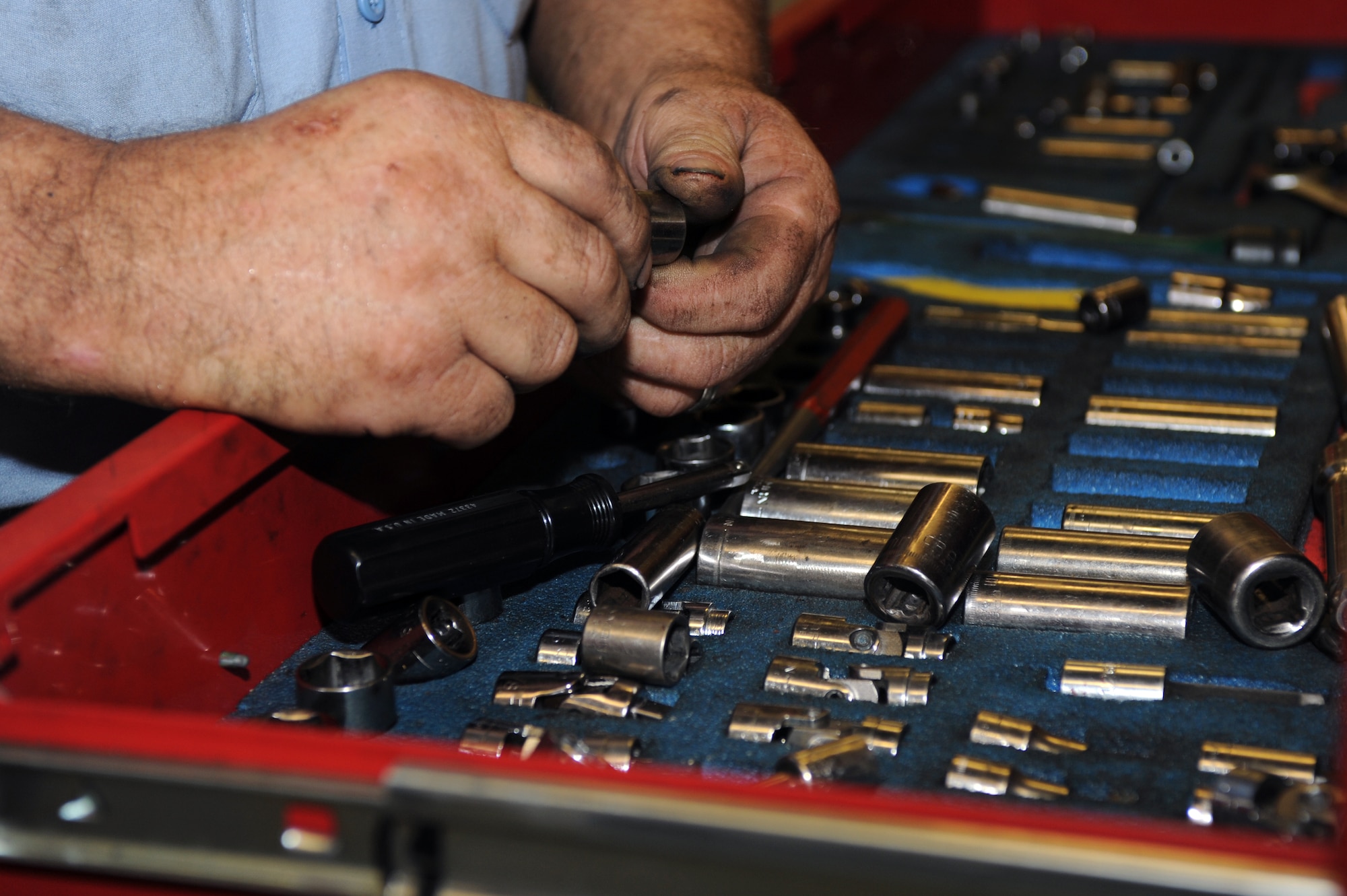 Jerry Cazeault, 4th Force Support Squadron mechanic, searches for the proper socket attachment at the Auto Hobby Shop on Seymour Johnson Air Force Base, N.C., Sept. 6, 2012. All the shop tools are accessible to those renting bays for self vehicle maintenance. (U.S. Air Force photo/Airman 1st Class John Nieves Camacho/Released)