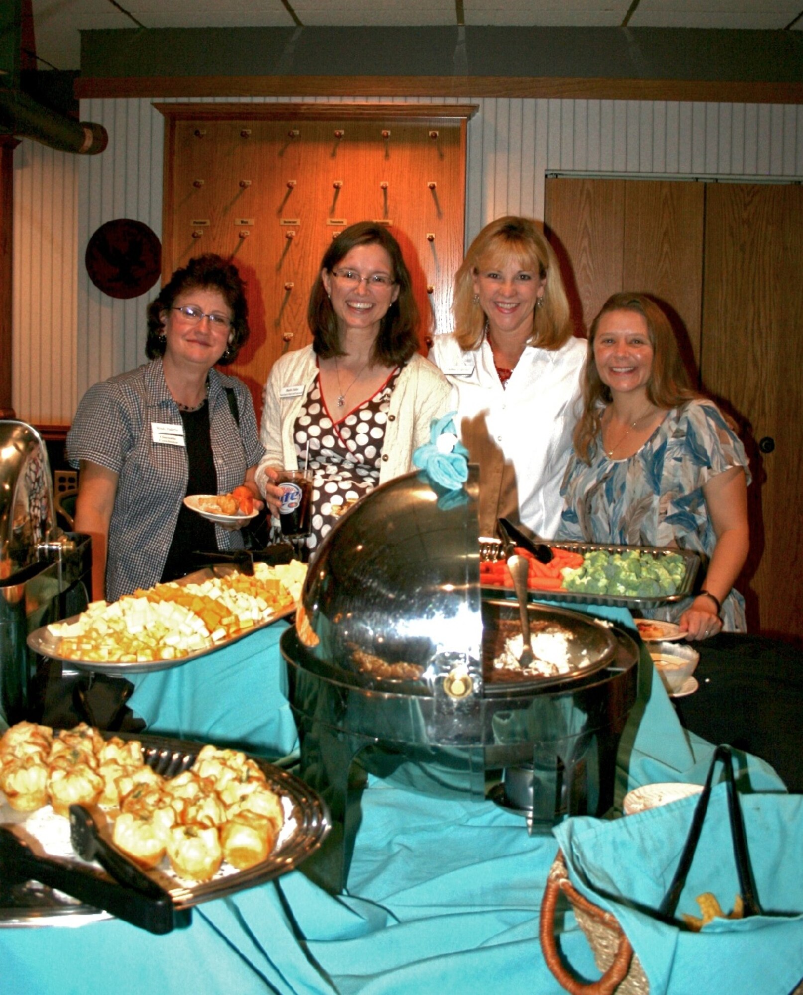 MINOT AIR FORCE BASE, N.D. -- Members of the Minot Officers' Spouses' Club partook in a meet and greet social at the Jimmy Doolittle Center recently, to encourage new membership and provide new spouses with a networking opportunity. New boosts in club membership allows the organization to further extend the services they offer to base personnel and the Minot community. (Courtesy photo)